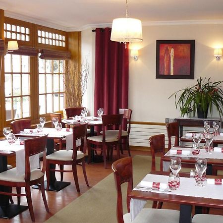 Hôtel-Restaurant Le Normandie Luc-sur-Mer Extérieur photo